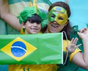 Supporters of Brazil wait for the start of the FIFA Confederations Cup Brazil 2013 Group A football match between Italy and Brazil, at the Fonte Nova Arena in Salvador, on June 22, 2013.   AFP PHOTO / VANDERLEI ALMEIDA